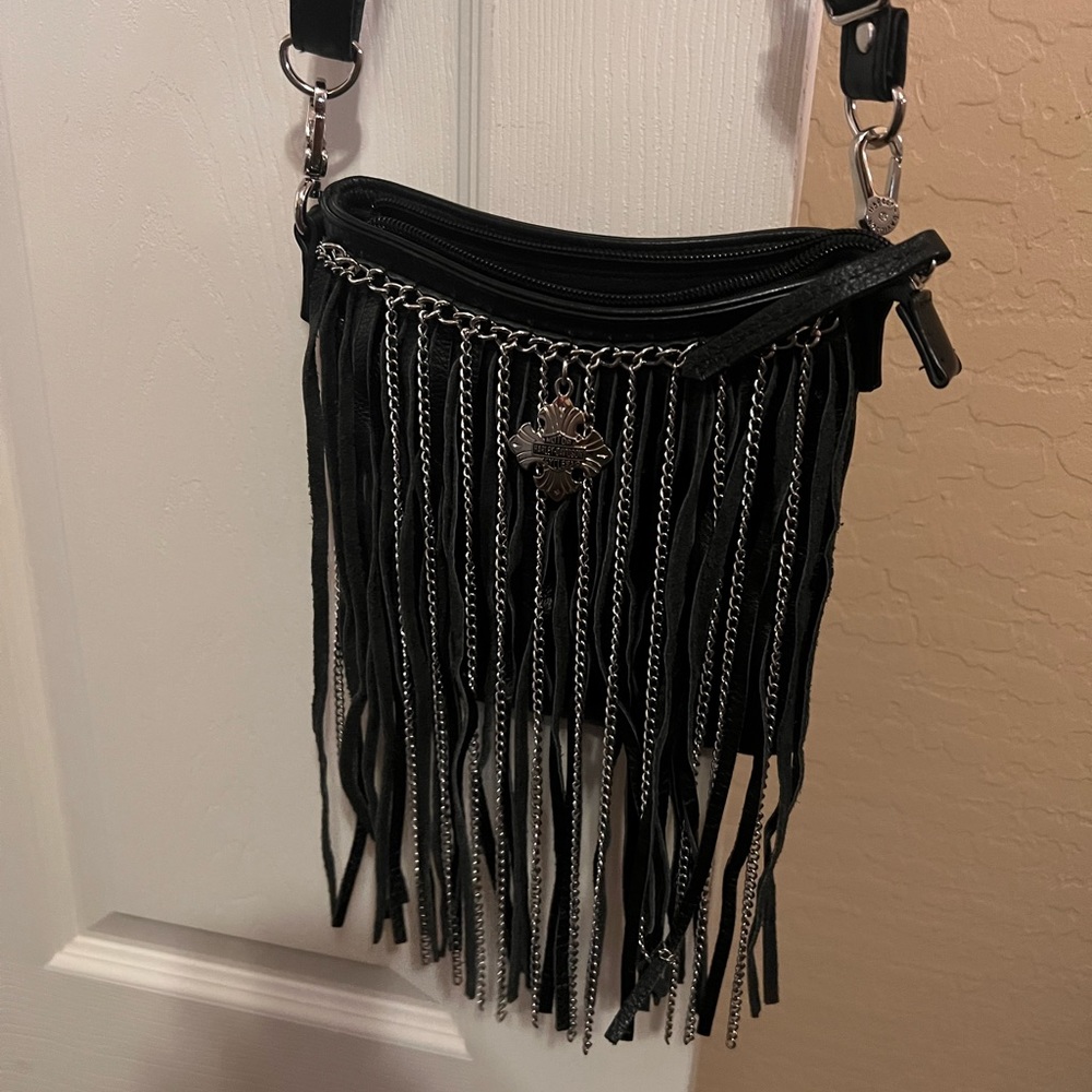 Black Harley bag. Silver chains   Over the shoulder or clips to belt loops.